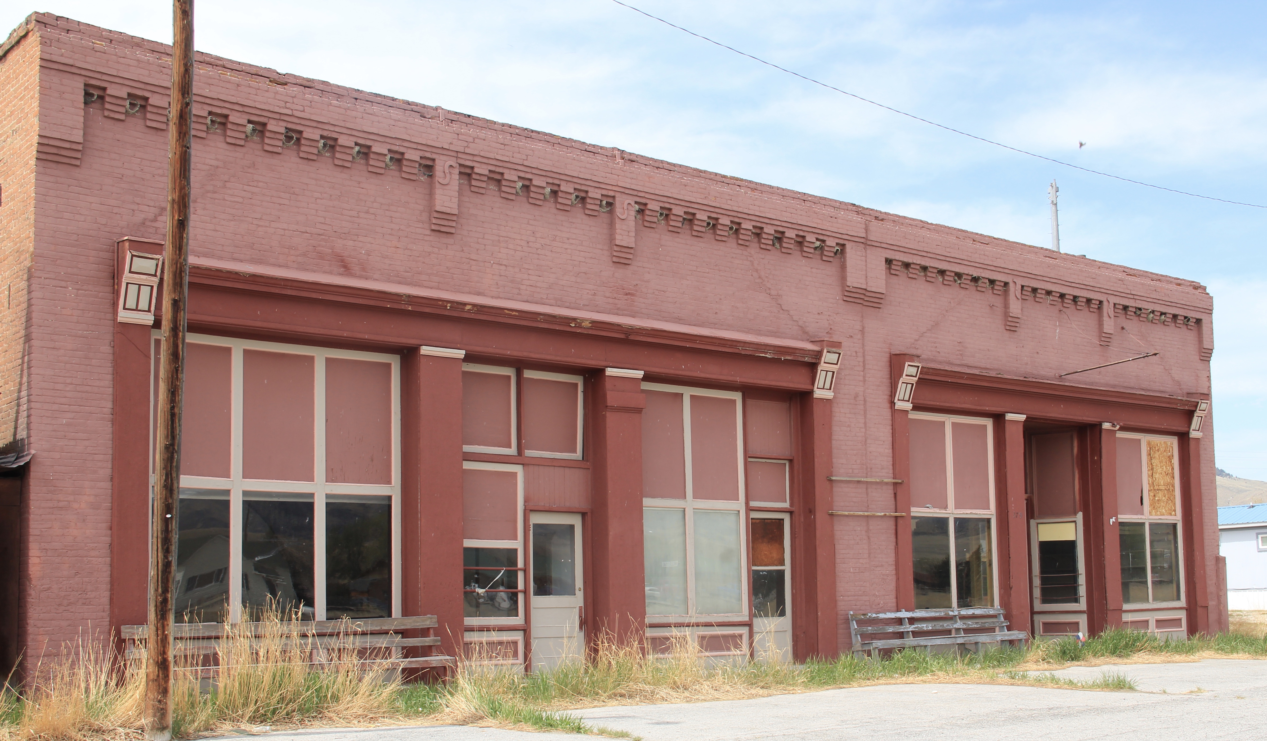 Brick stores, symmetrical plan, Melrose