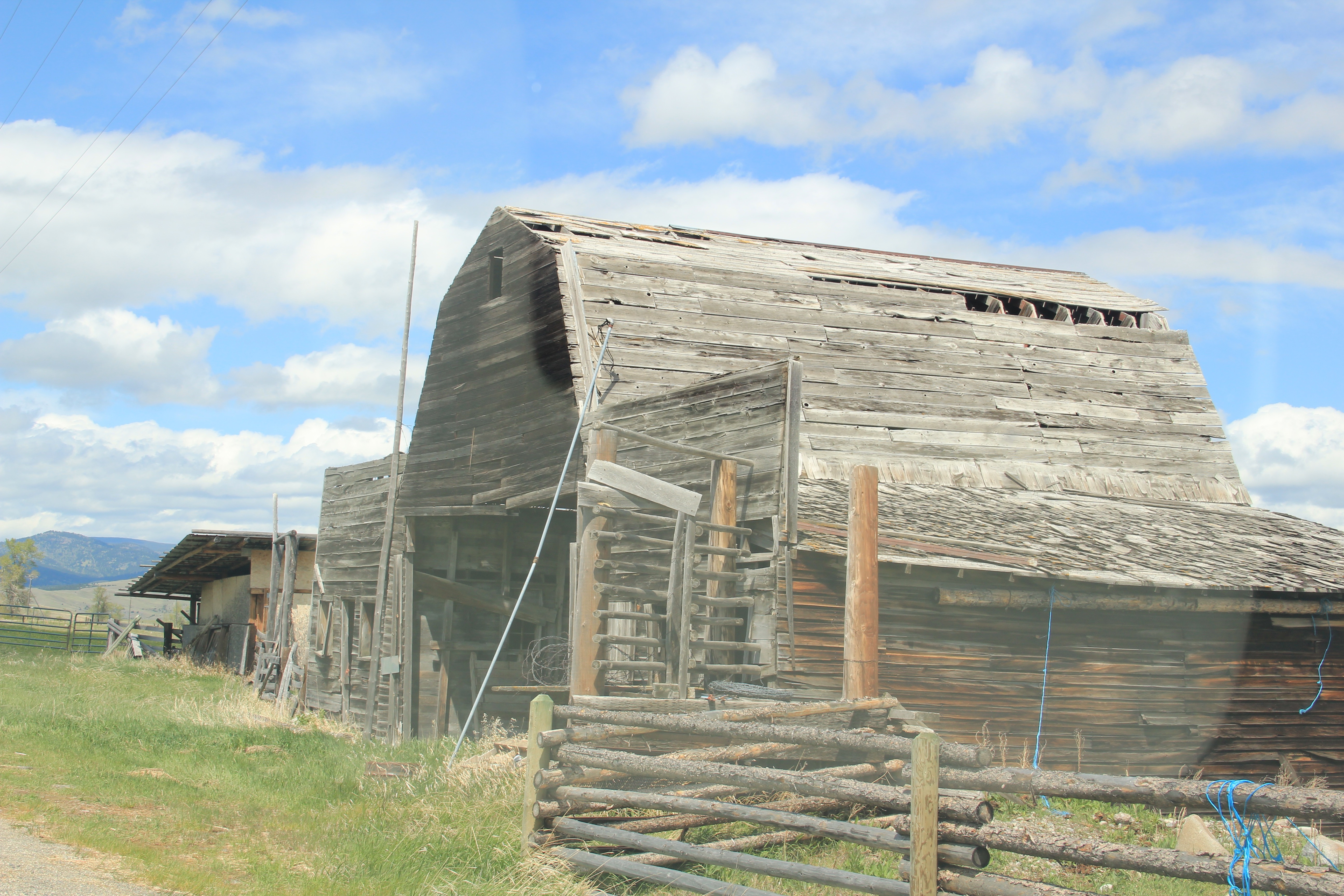 Old buildings grafted into barn, E of Pioneer, Powell Co