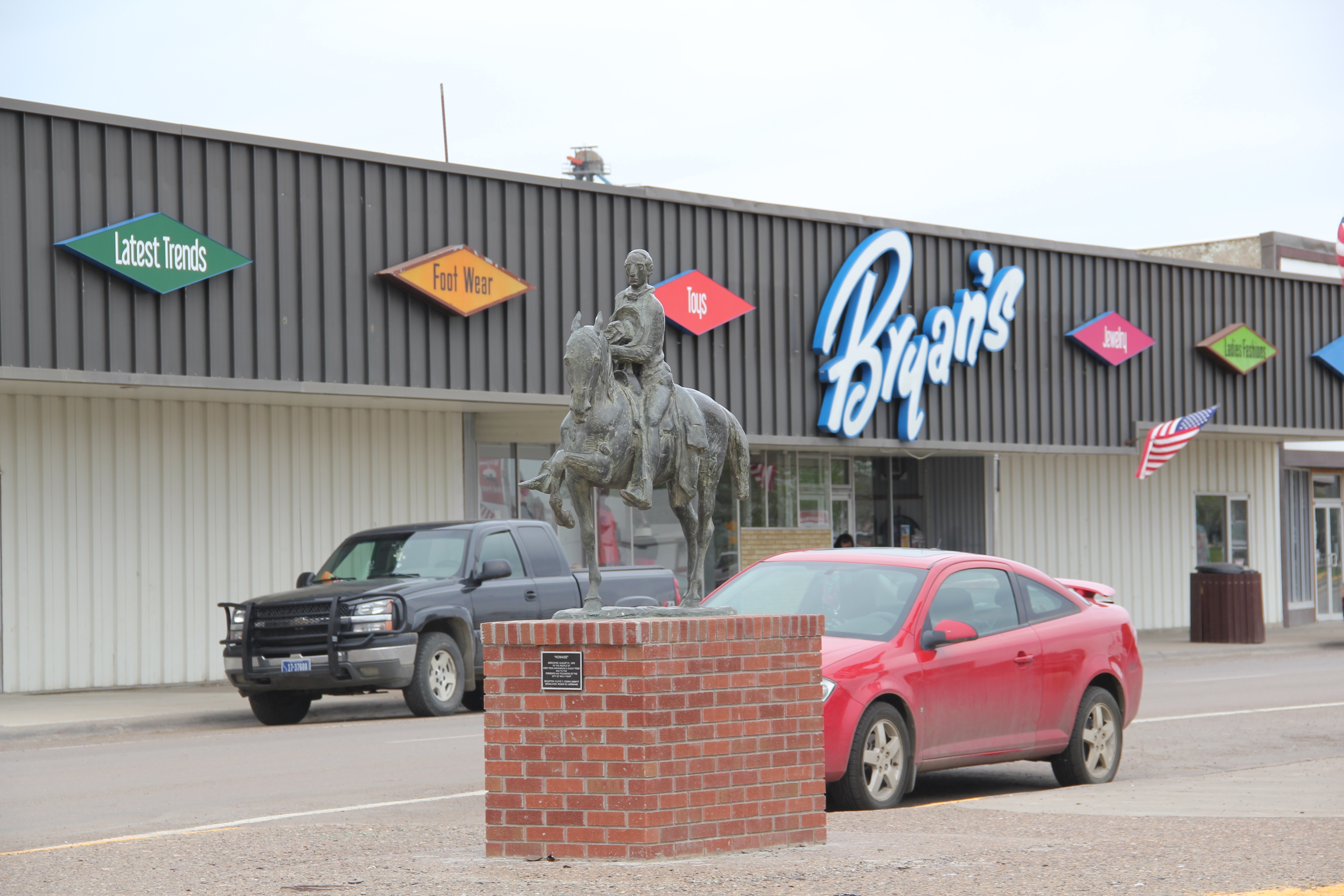 Roosevelt Co Wolf Point 3 cowboy sculpture Homage by Floyd DeWitt